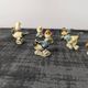Set of 11 miniature birds in polychrome glazed ceramic.