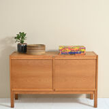 Oak sideboard with retractable doors