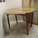 ﻿Round shutter table in solid walnut