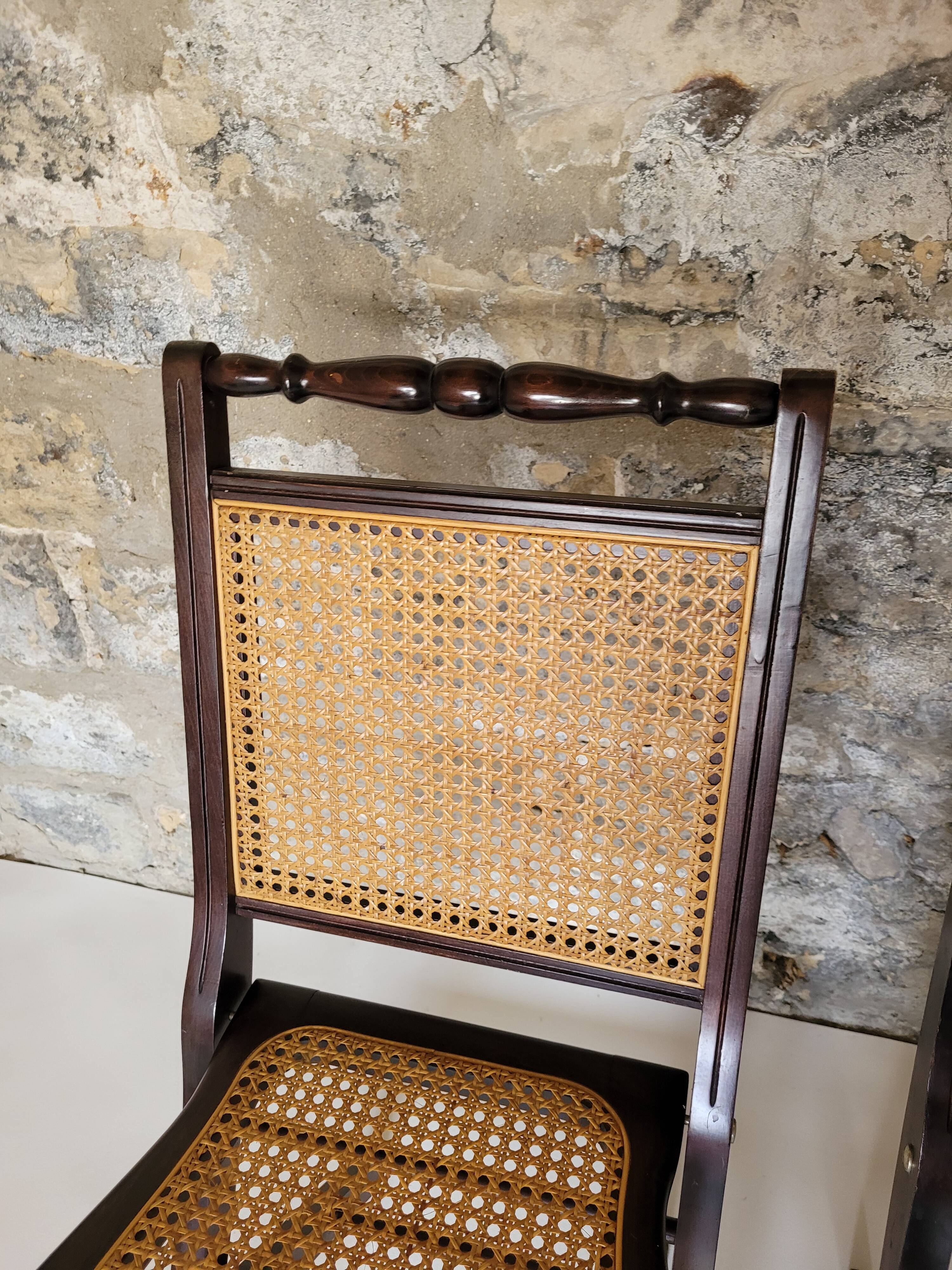Pair of folding cane chairs