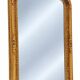 Grand miroir baroque en or avec un crête orné.