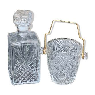 Ice bucket and whiskey decanter made of vintage chiseled transparent glass