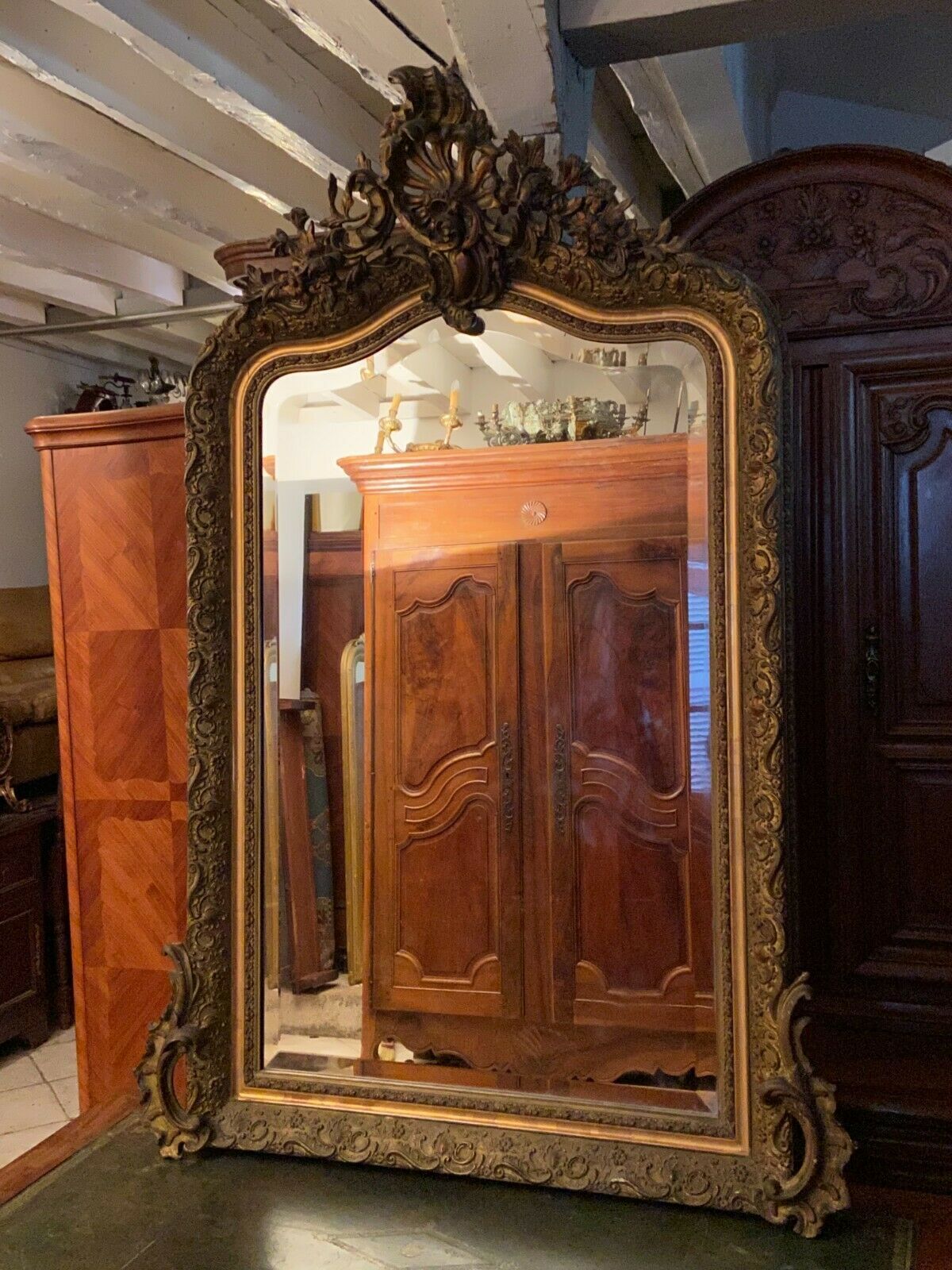 Golden mirror with bevelled ice pediment in Regency style