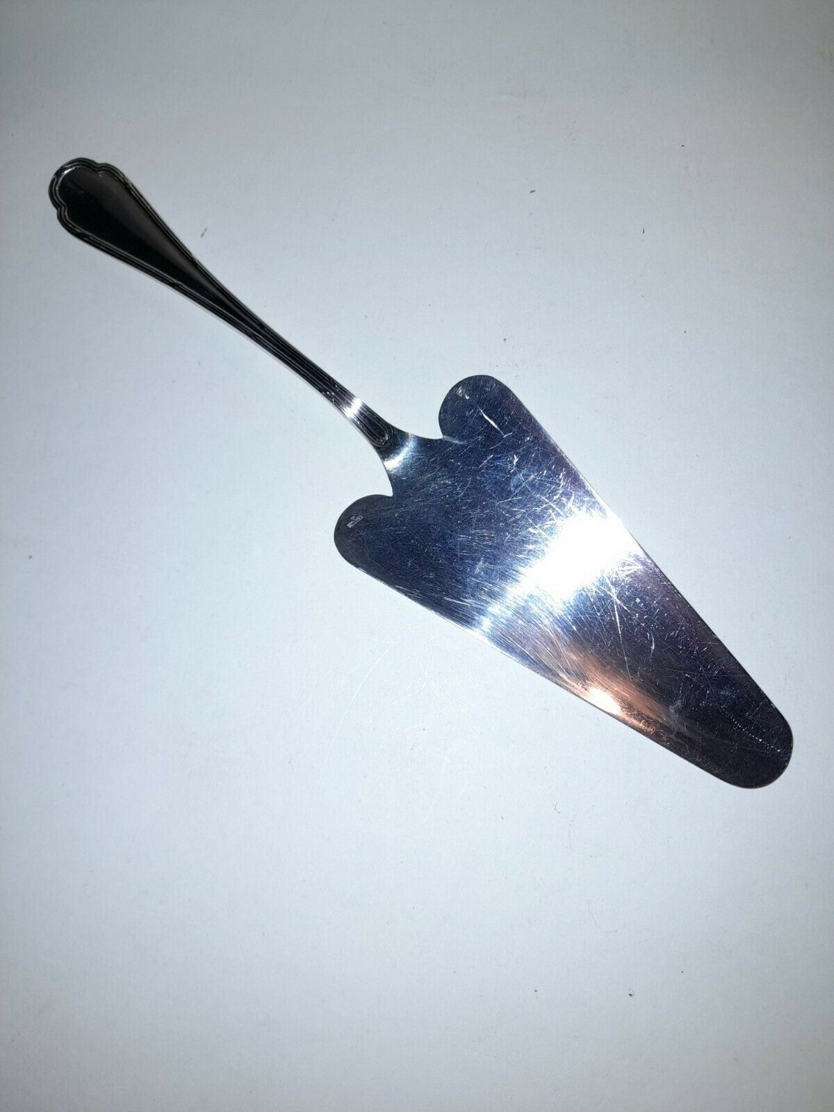 Ercuis pie shovel with silver metal net