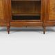 Art Deco showcase bookcase in carved walnut, France, circa 1925