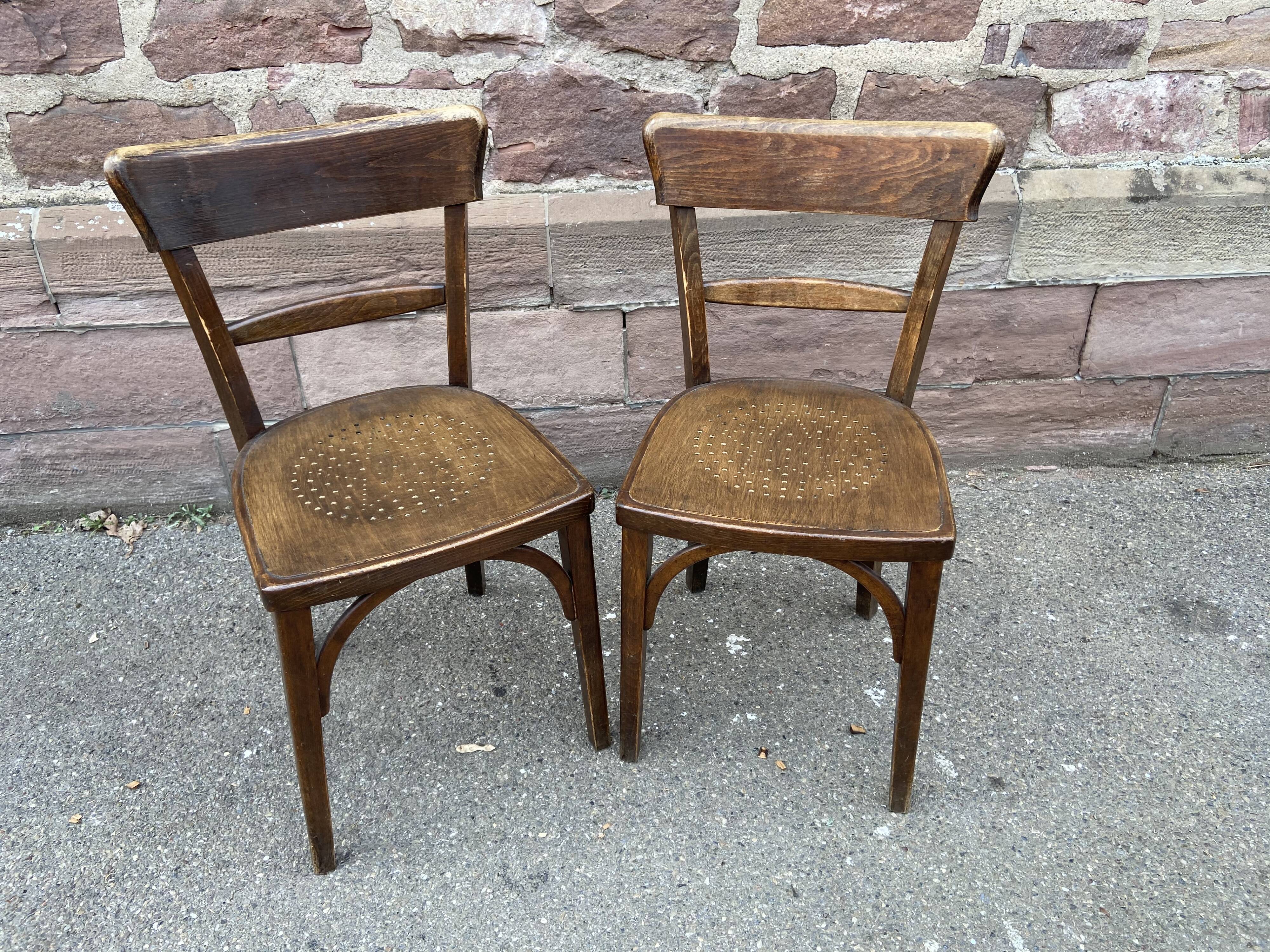 Pair of curved wooden brasserie chair