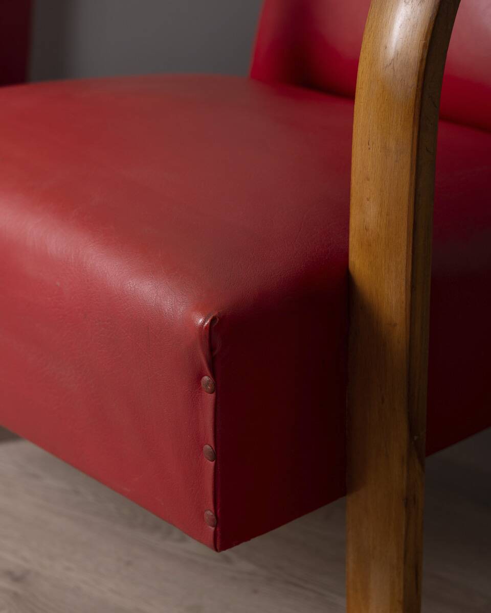 Pair of vintage 1950's armchairs in red leather, italian design