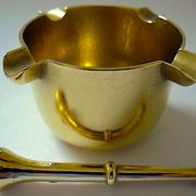Three "vintage" bronze ashtrays with golden natural patina forming mortars with their drumsticks