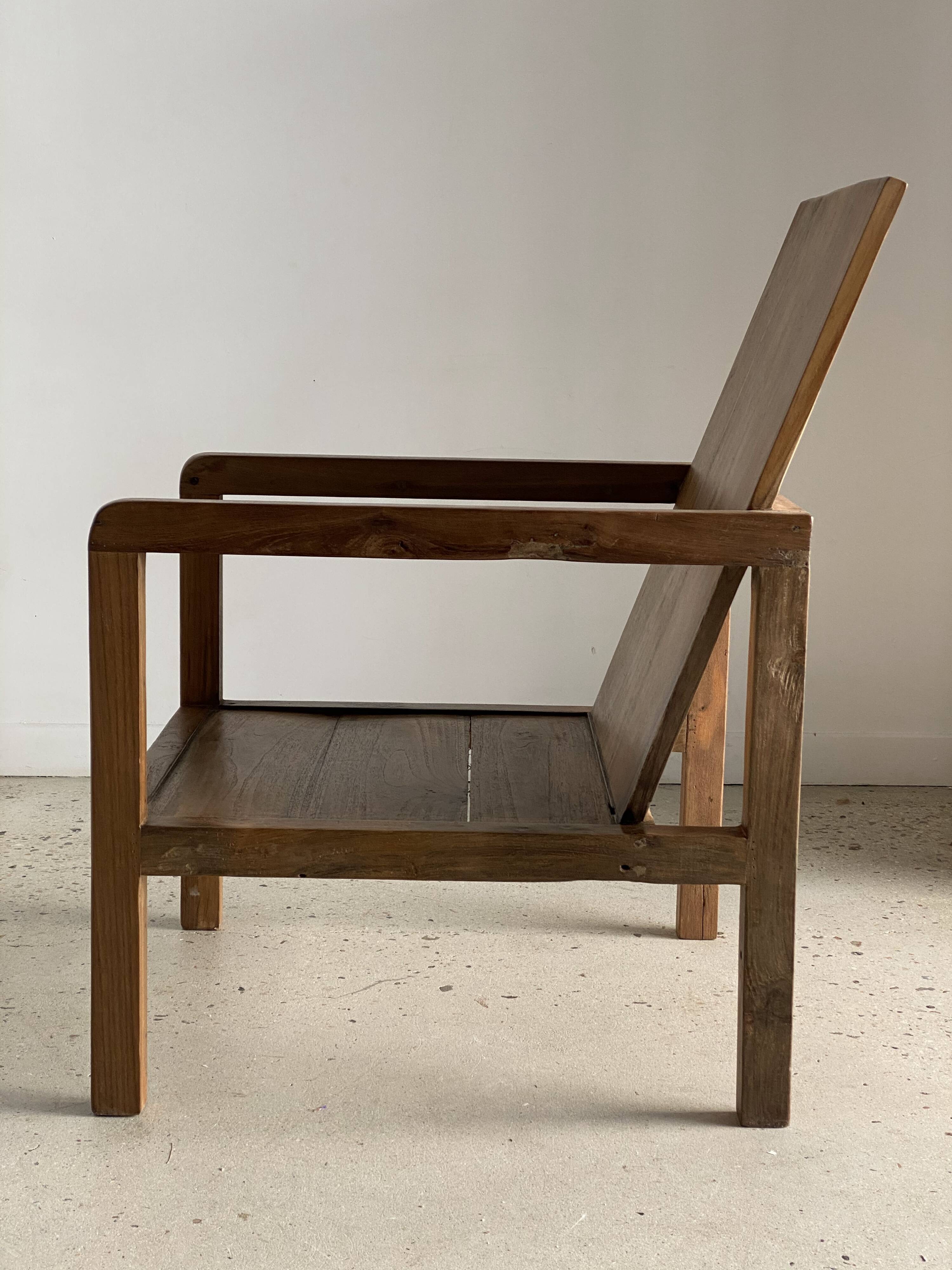 Armchair in natural wood (teak) minimalist design