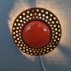 Wall light made from brown and red ceramic. Signed Norman Motala Sweden 1970s.