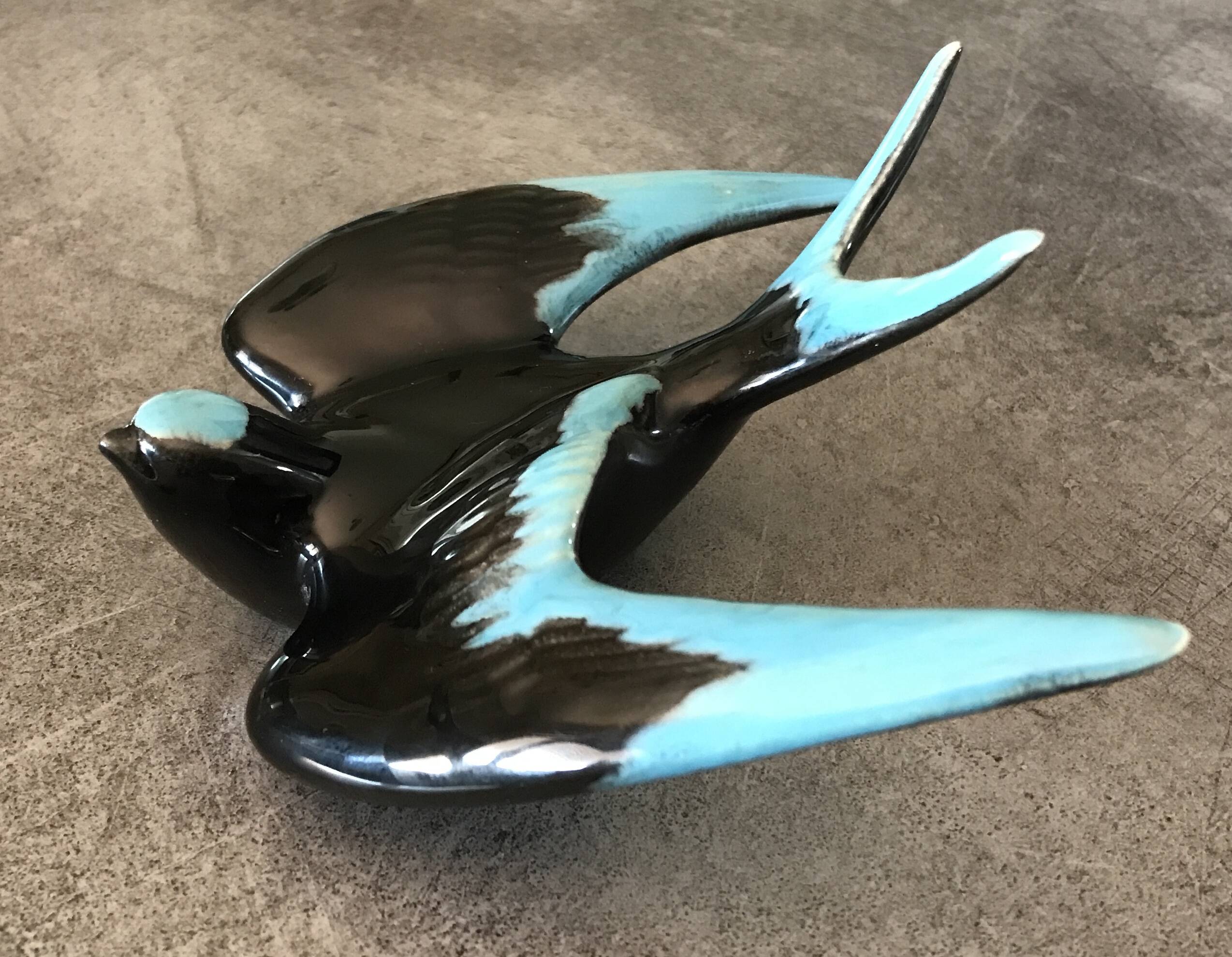 Vintage swallow in two-tone black and blue enameled ceramic