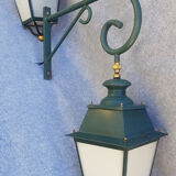 Pair of antique lanterns on its gallows