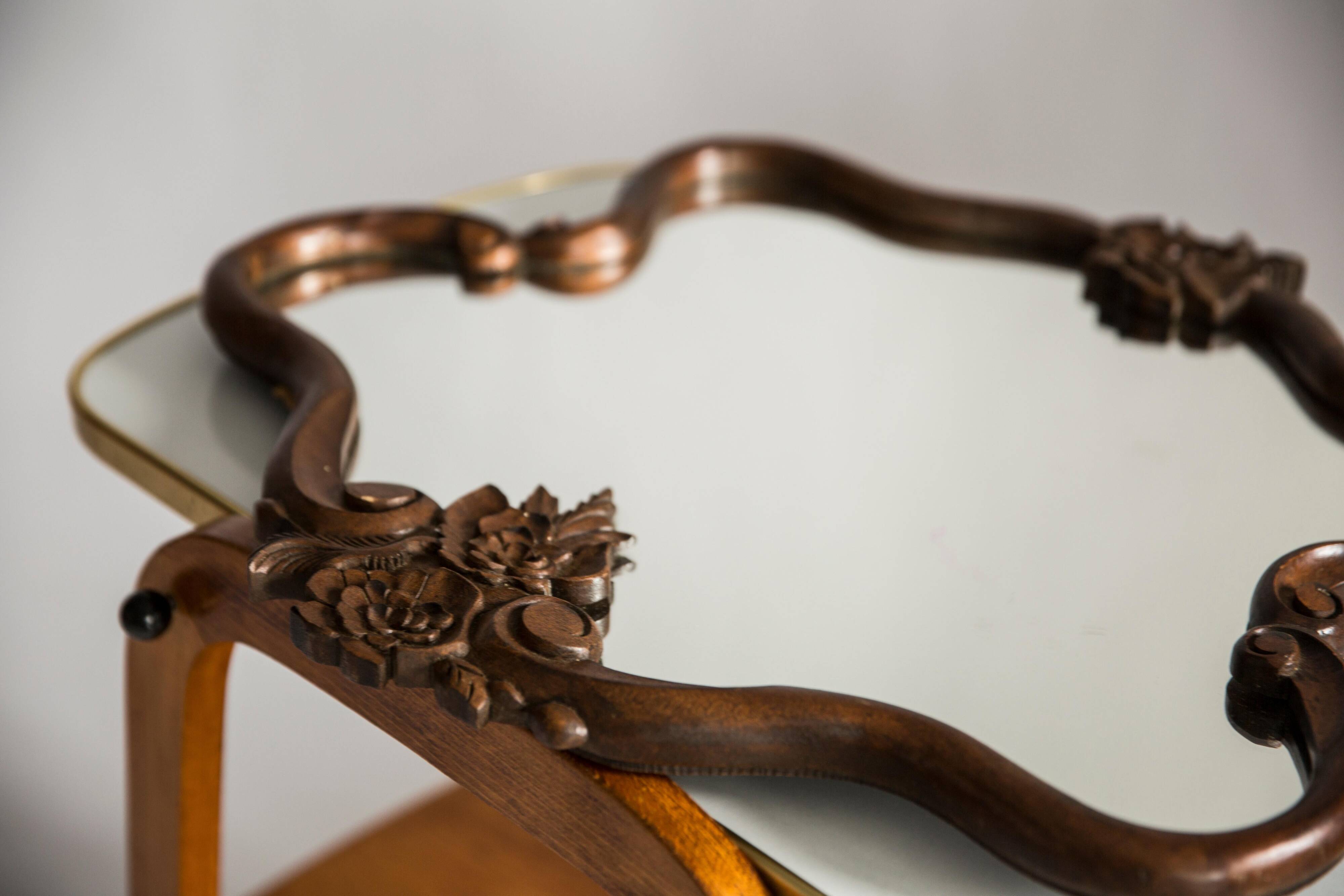 Medium vintage mirror in dark brown wood, Europe, 1960.