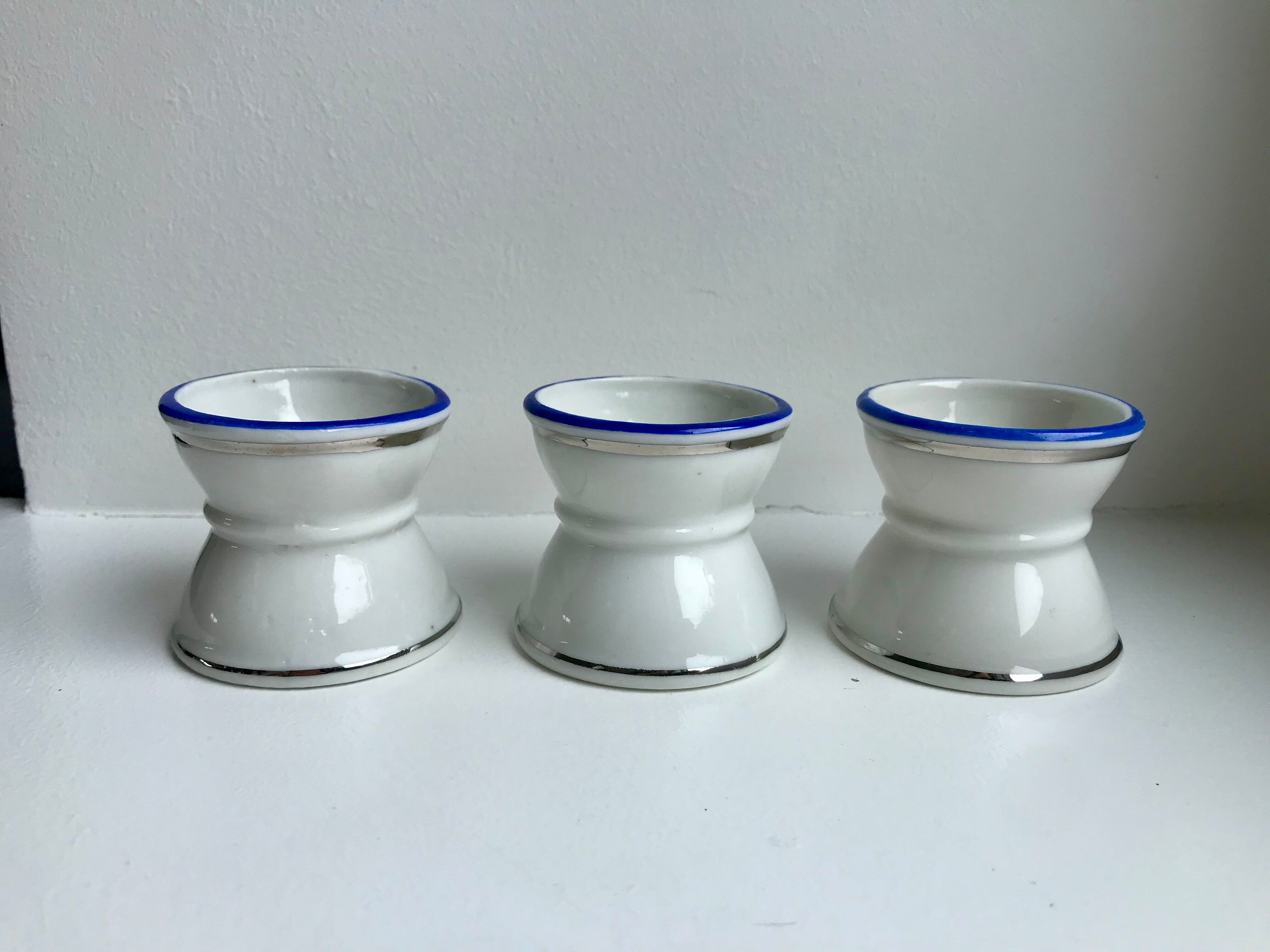 Trio of shells diabolo white edging silver and bright blue 50s