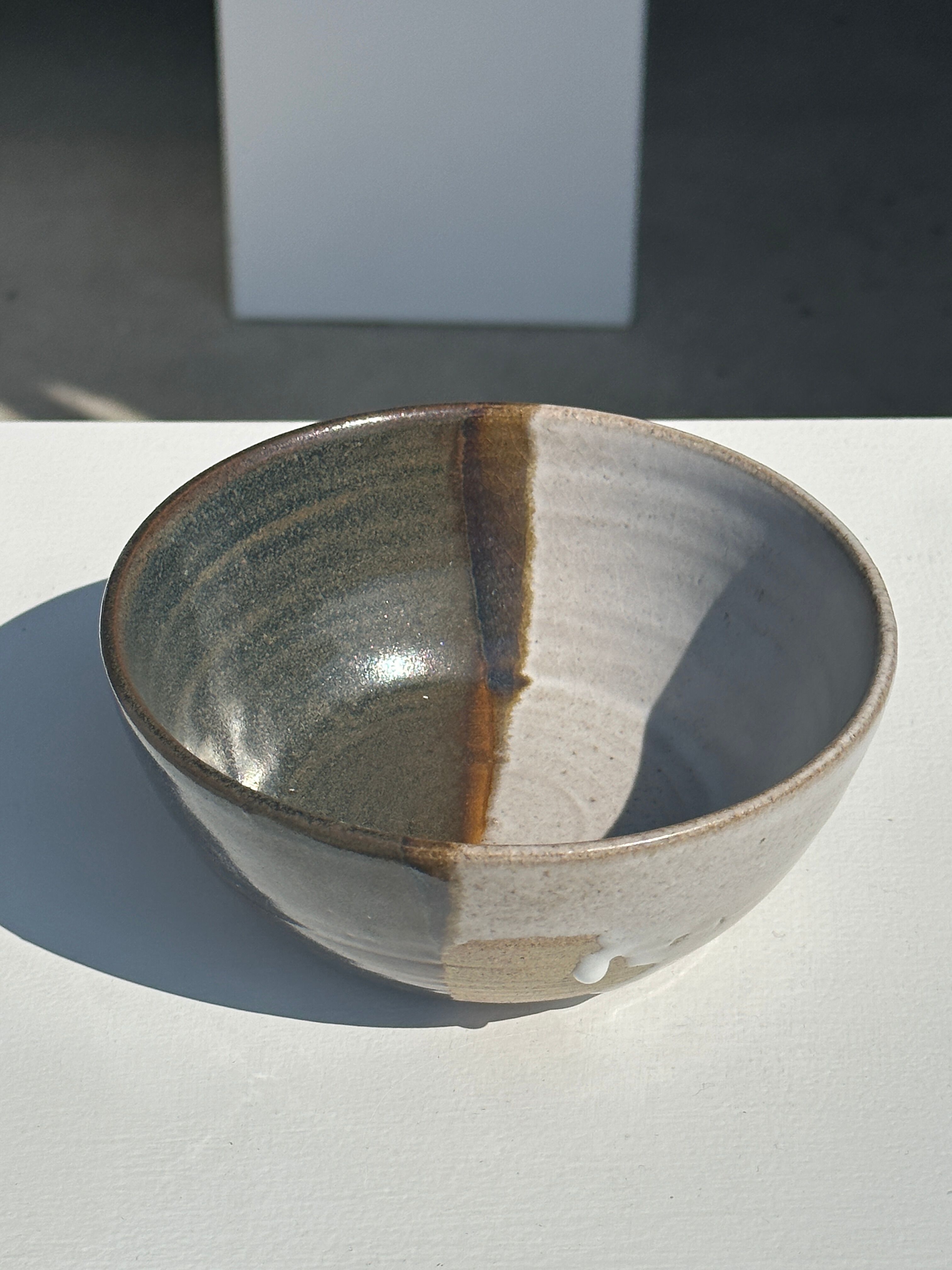 White and glossy brown two-tone ceramic bowl, matt earth