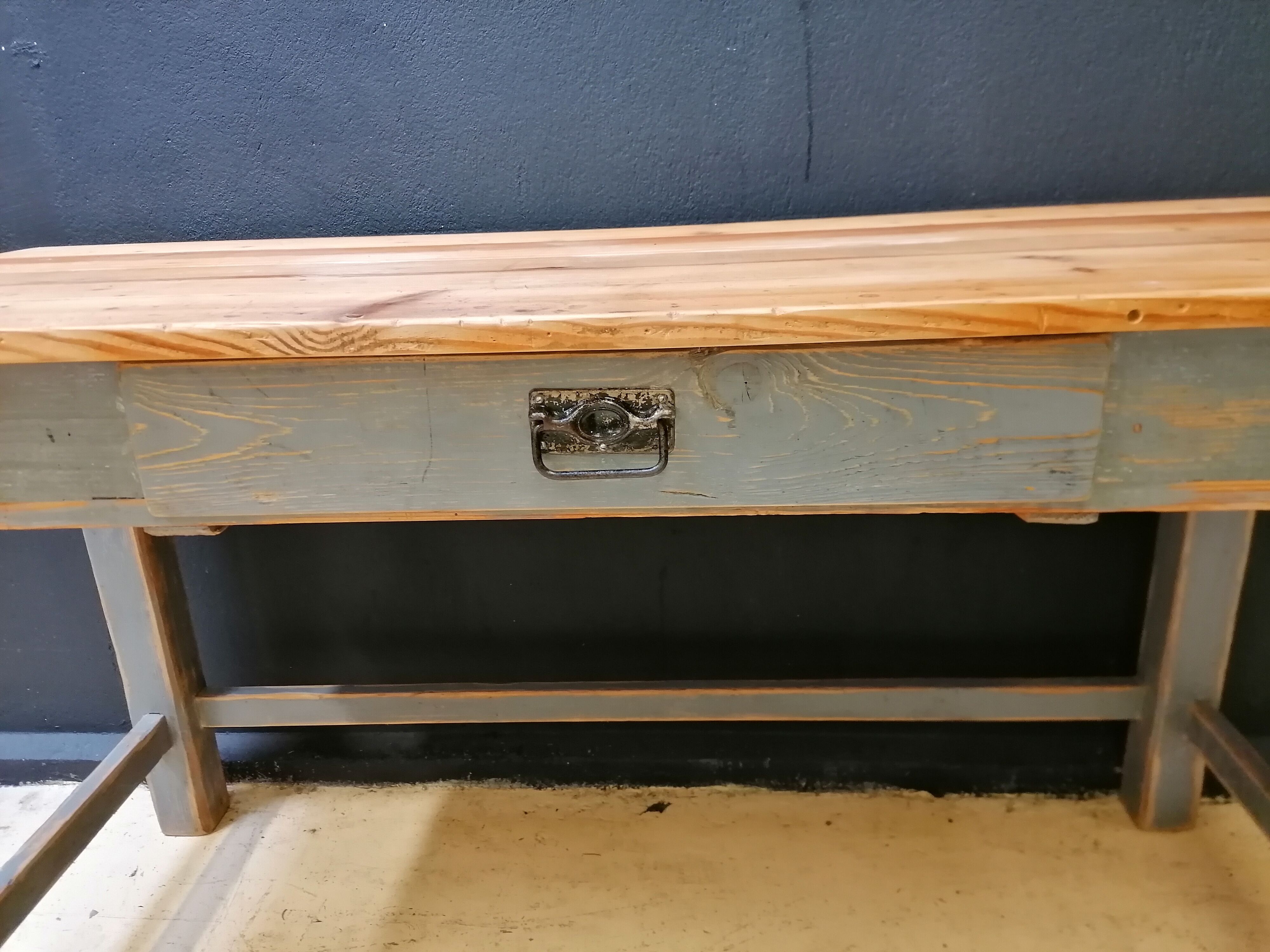 Patinated drapery table