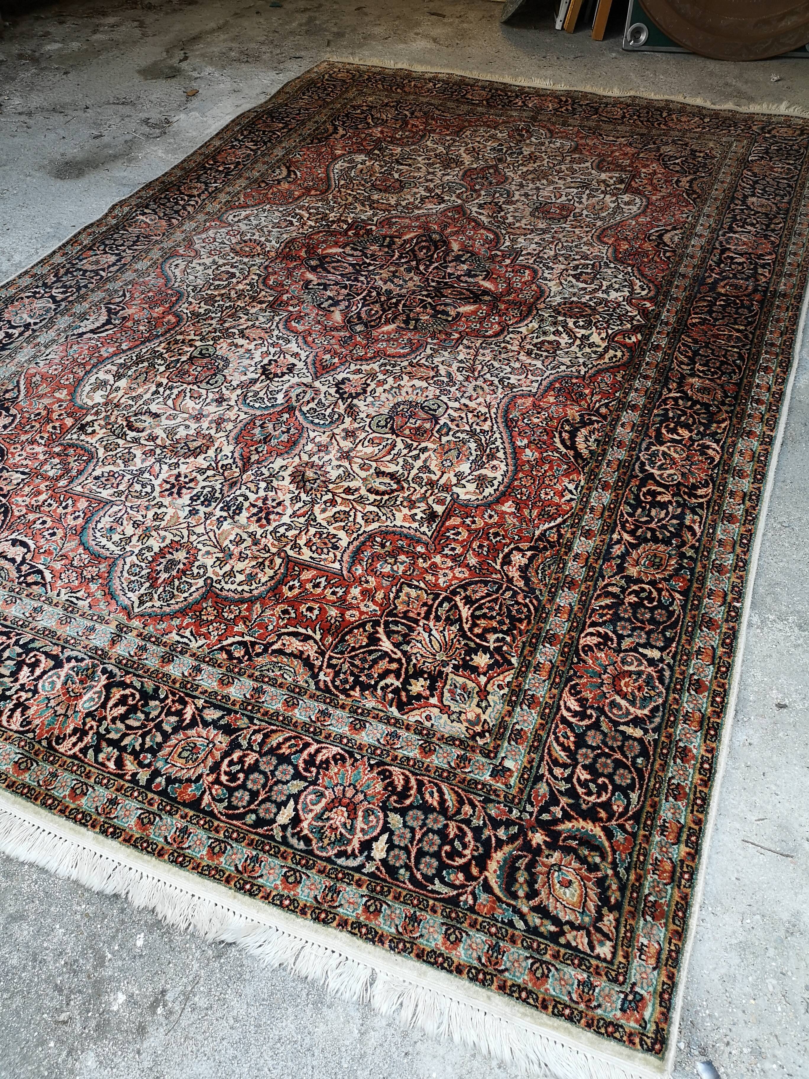 Ancient Indian silk carpet and wool