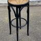 High curved black caned wooden bistro bar stool