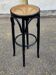 High curved black caned wooden bistro bar stool