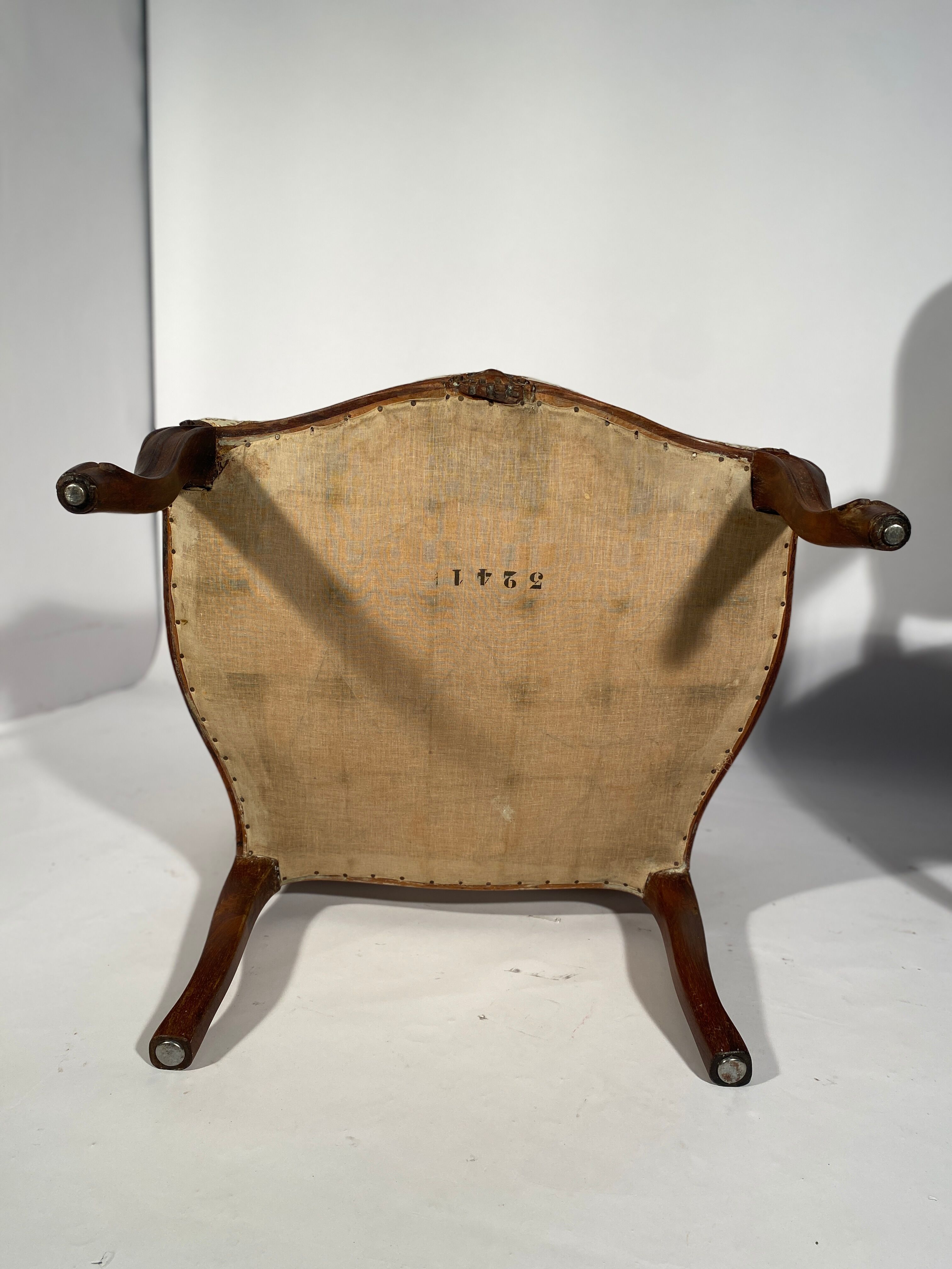 Louis XV style living room including a pair of armchairs and three chairs