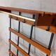 Wall coat rack in teak and vintage black metal