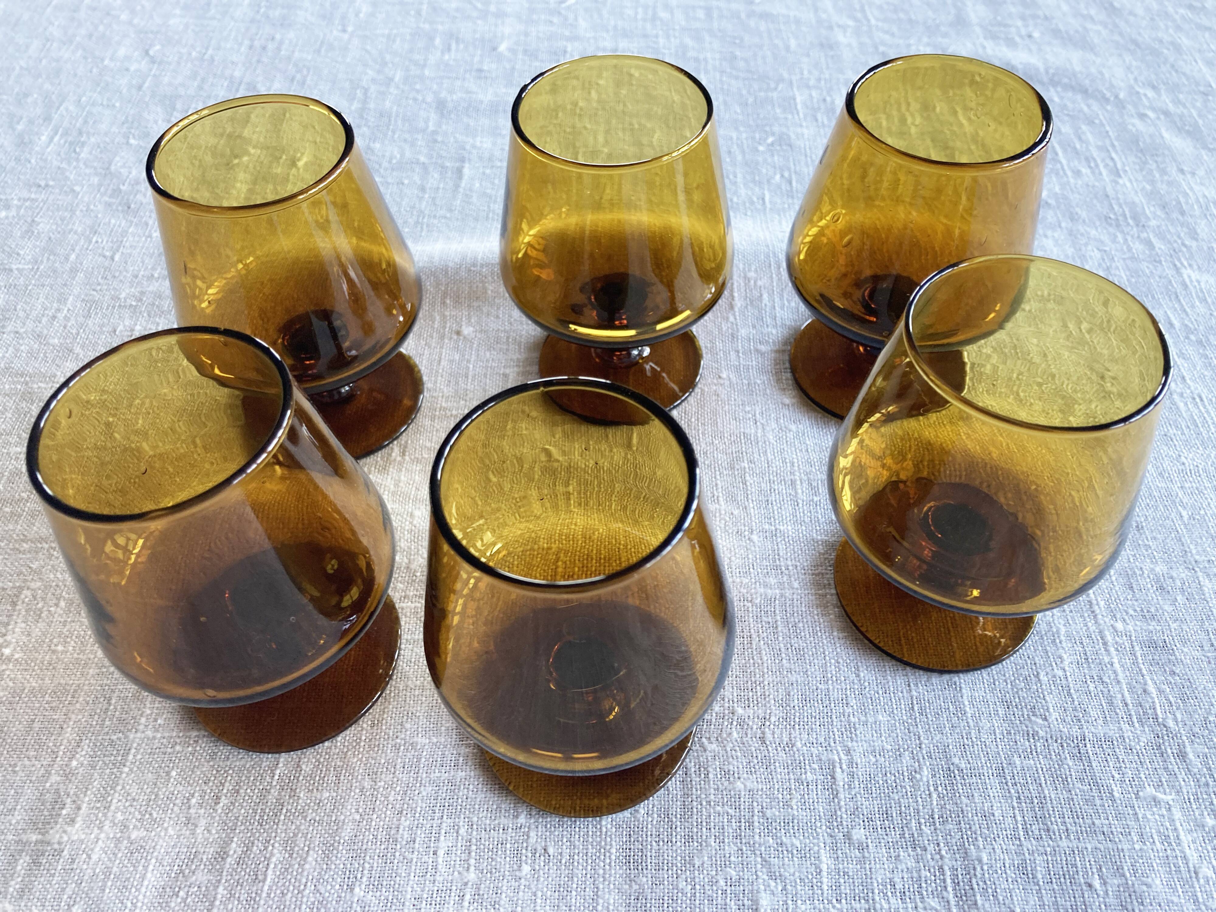 6 small amber glass stemmed glasses