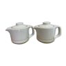 White porcelain teapots with green mesh