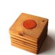 Six coasters in wood and orange ceramic, 70s