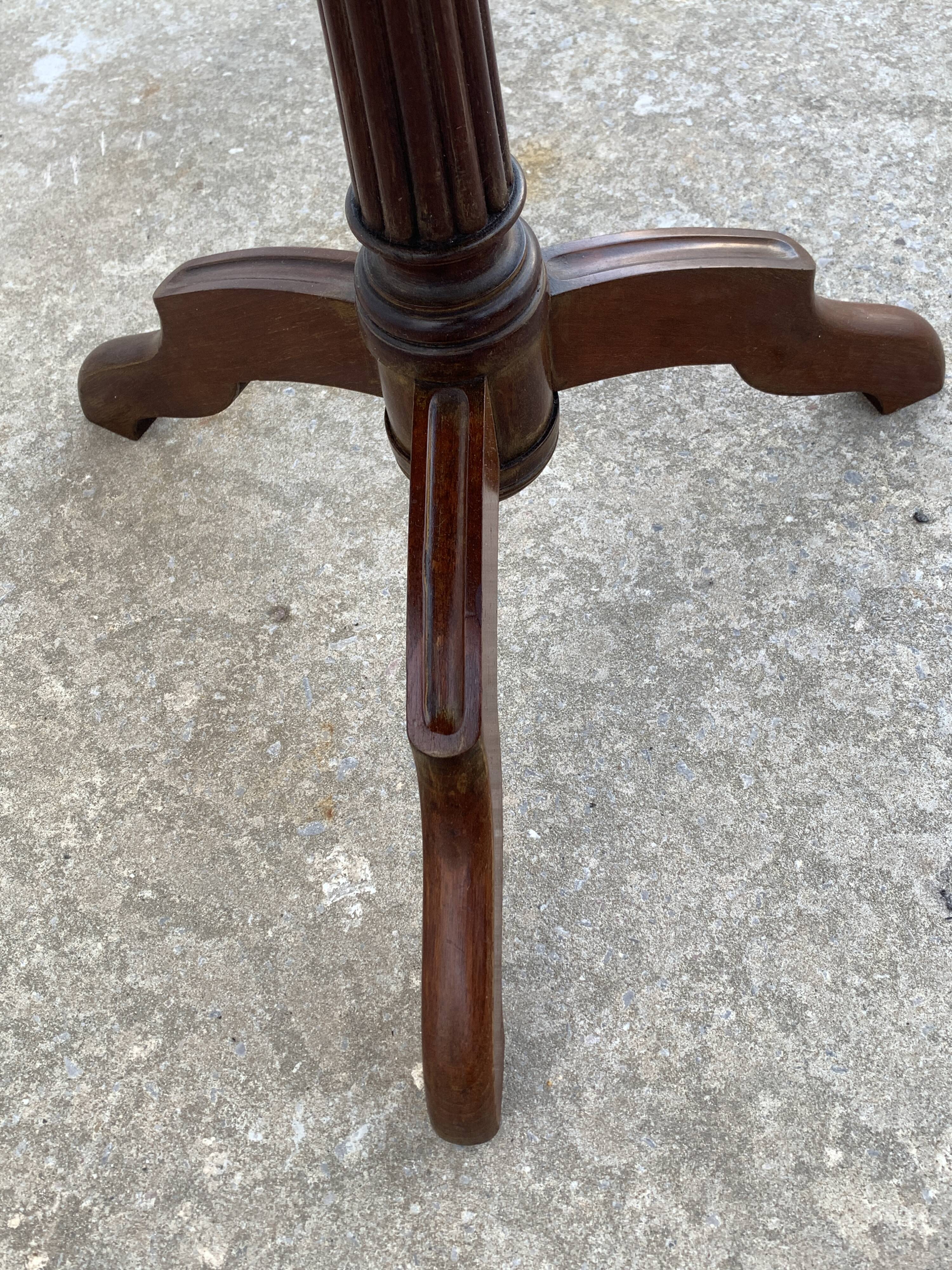 Late 19th century tripod pedestal table in wood marquetry
