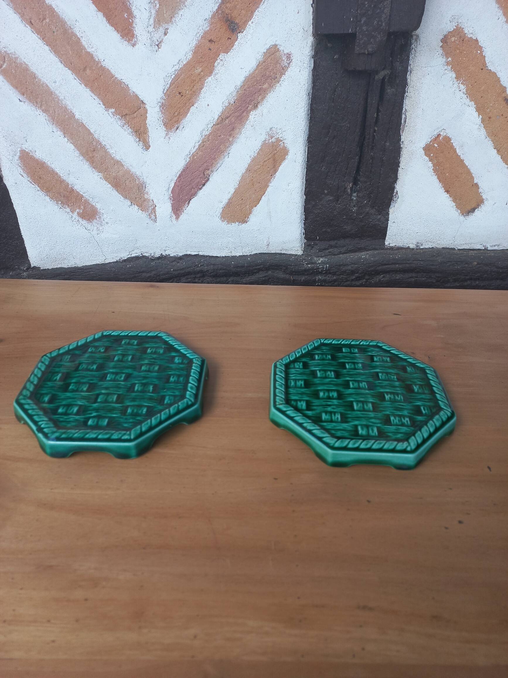 Pair of Digoin Sarreguemines barbotine bottle coasters