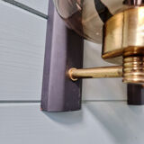 Pair of wall sconces in brass and smoked glass, 1960s.