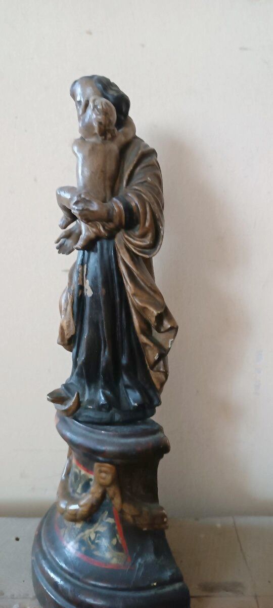 Ancient polychrome wooden sculpture representing the Virgin and Child, from