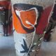 X5 enamelled ceramic mugs with abstract 60s decor