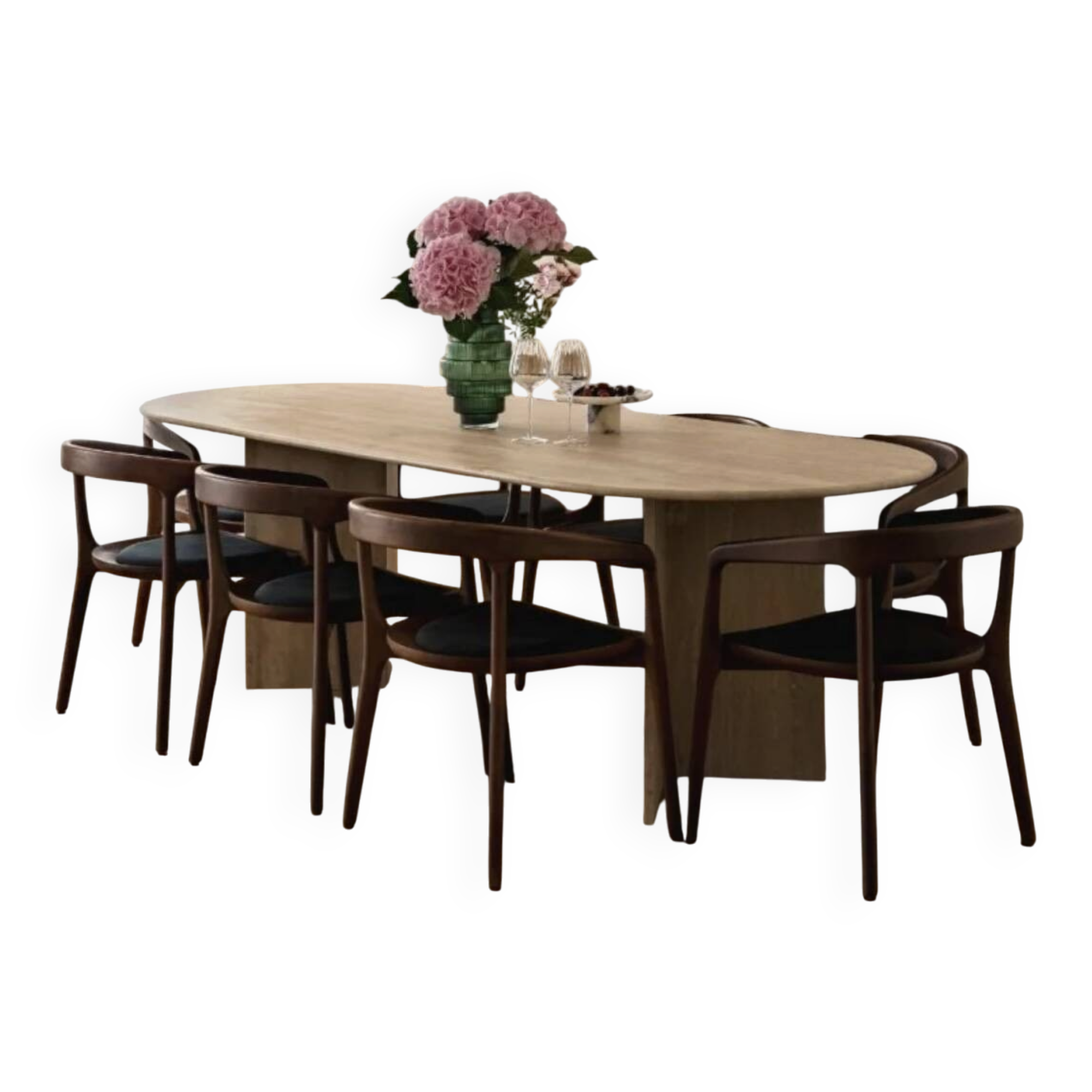 Oblong dining table in beige travertine.