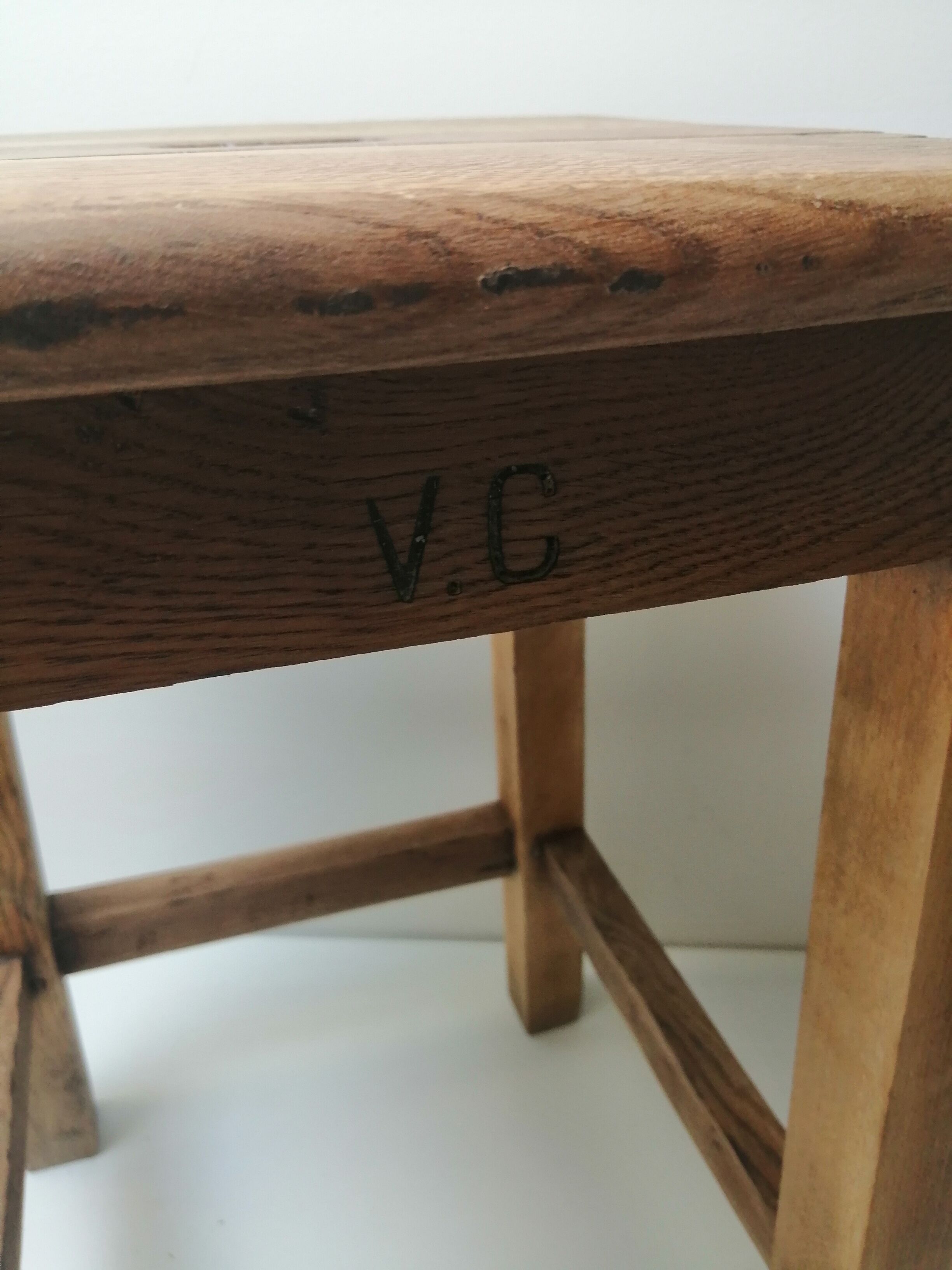 Old farm or workshop stool in oak