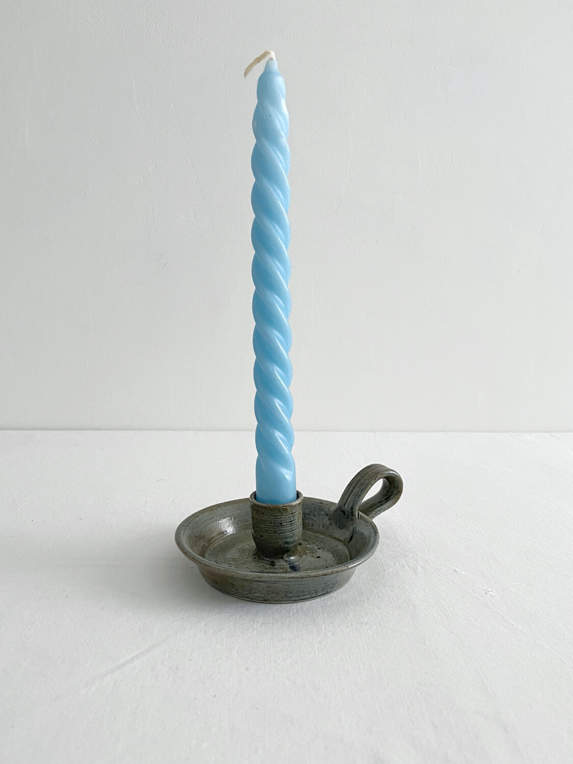 Vintage glazed stoneware hand candlestick