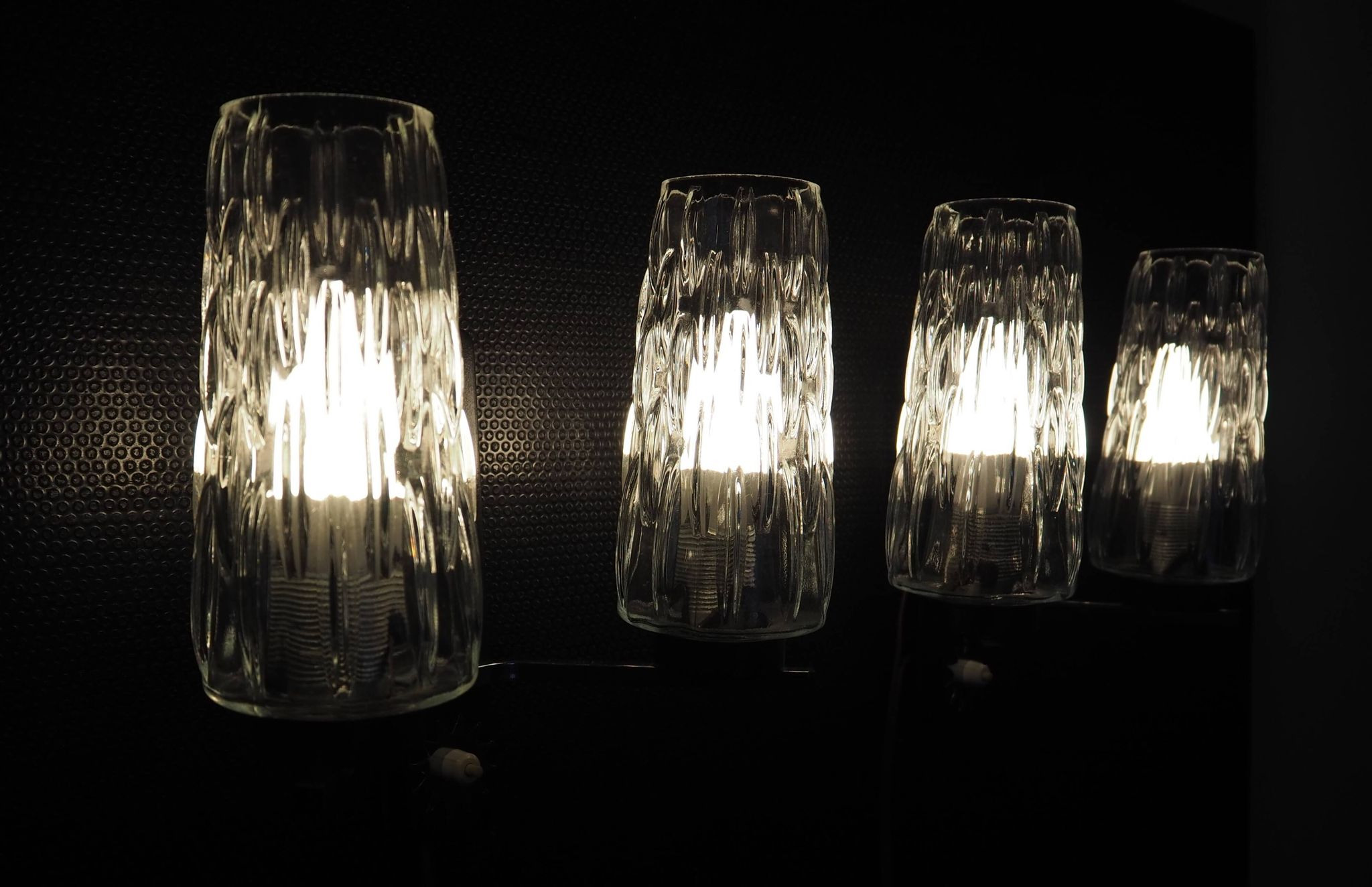 Pair of wall lights from the 1950s-1960s with a push button switch.