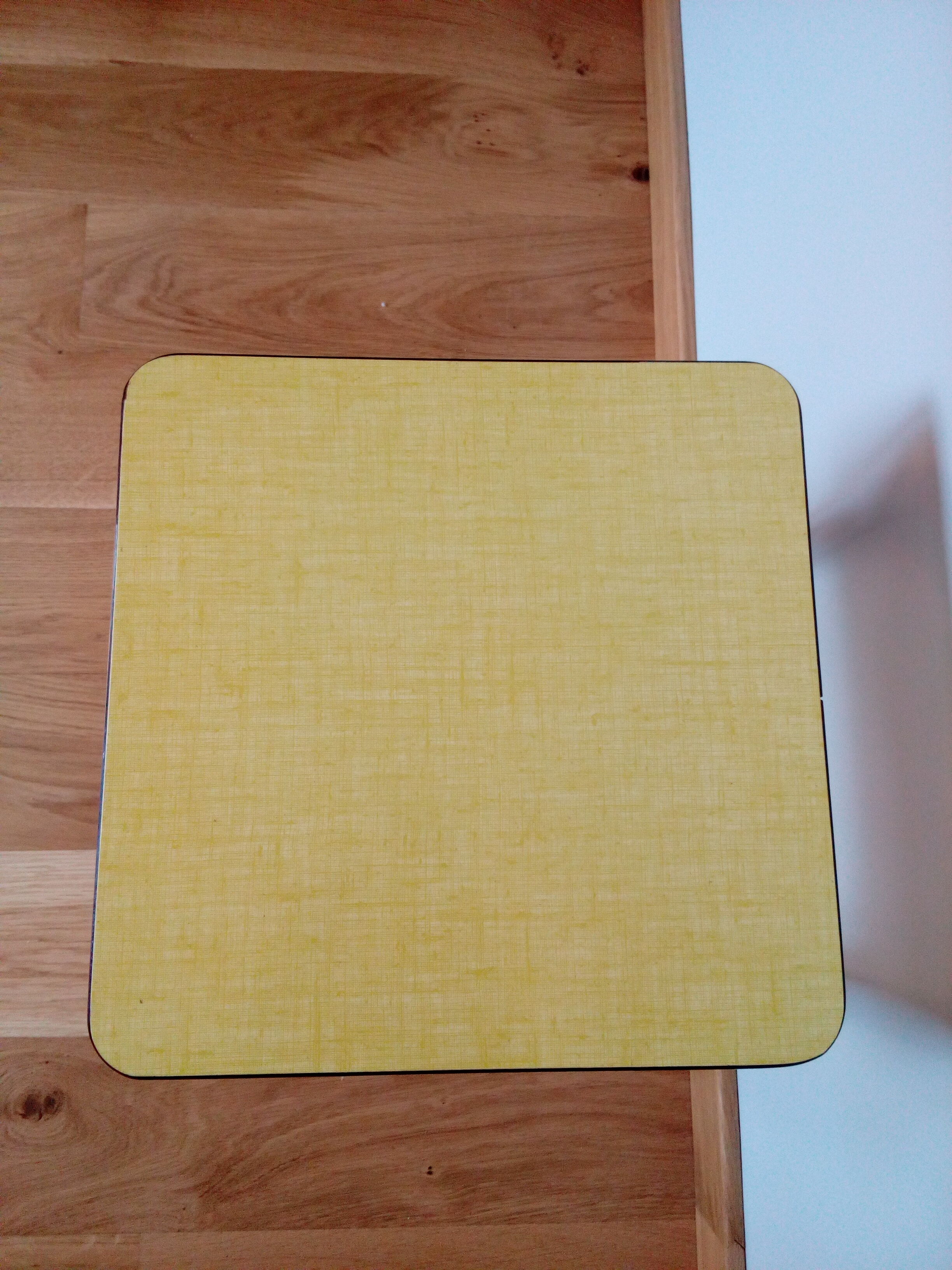 Yellow formica and chrome metal barstool