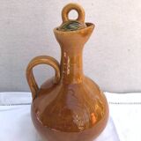 Old carafe with 8 ceramic glasses