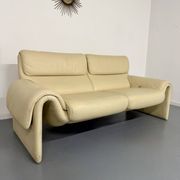 Two-seater designer sofa De Sede DS-2011 in cream leather with adjustable backrest.