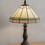 Tiffany-style stained glass lamp in green and amber white with vintage inspiration.