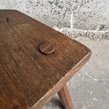 Dark brown solid oak brutalist stool with sculptural backrest, handcrafted mid-century rustic primitive