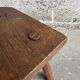 Dark brown solid oak brutalist stool with sculptural backrest, handcrafted mid-century rustic primitive