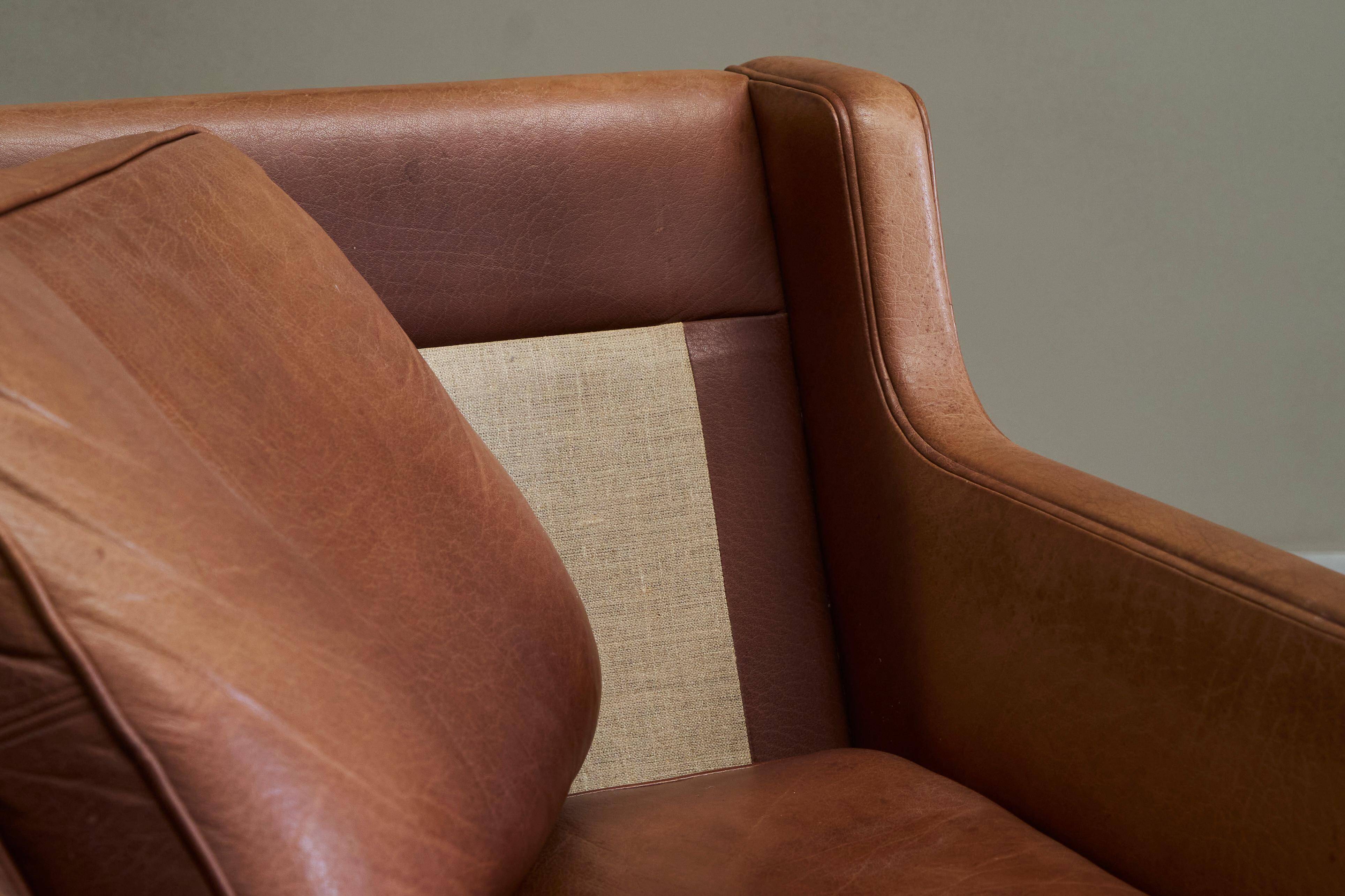 1970s patinated leather Scandinavian lounge chair