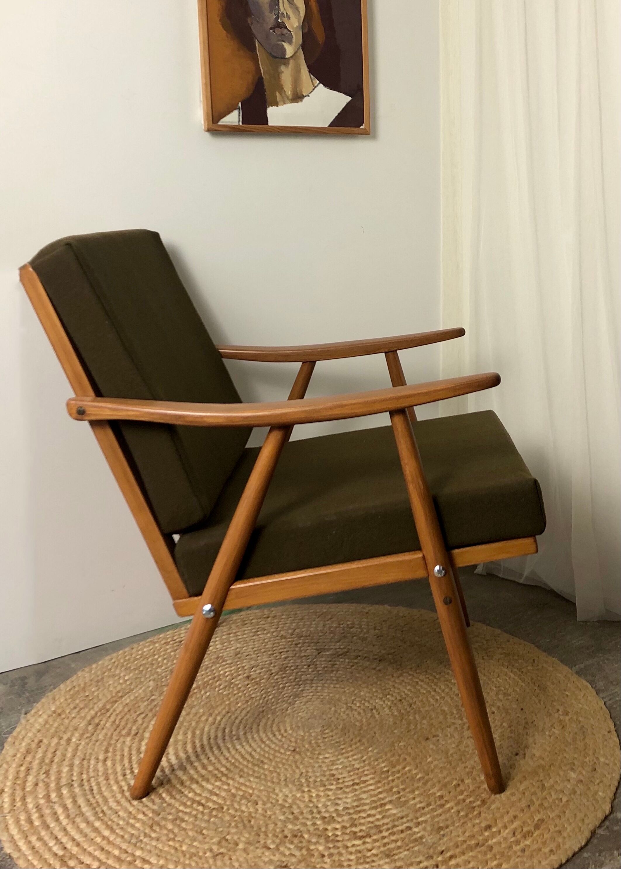 Boomerang armchair