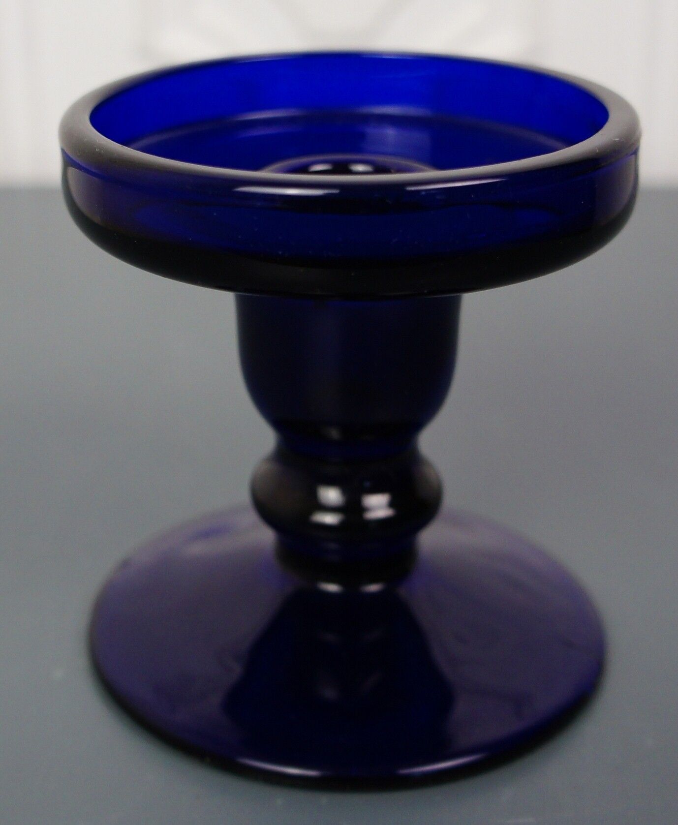 Blue tinted glass candlestick