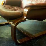 Scandinavian bentwood cantilever leather lounge chair with footrest, 1960s