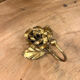 Pink-shaped hook in gilded metal