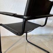 Set of 12 vintage black leather and tubular steel chairs – Italy, year