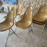 DSS fiberglass stacking chairs by Ray and Charles Eames for Herman Miller